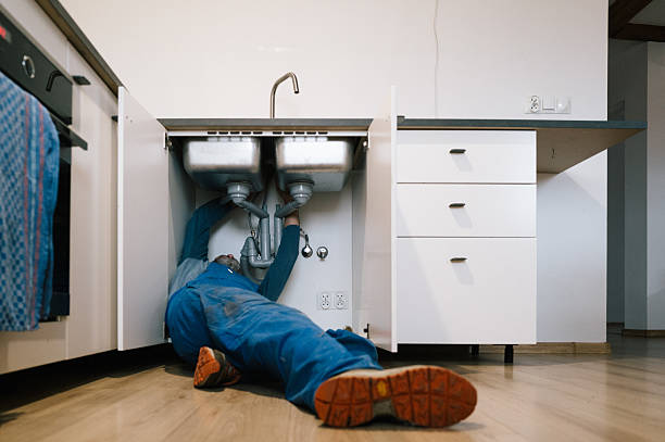 Professional Plumbing technician working in Borden, IN